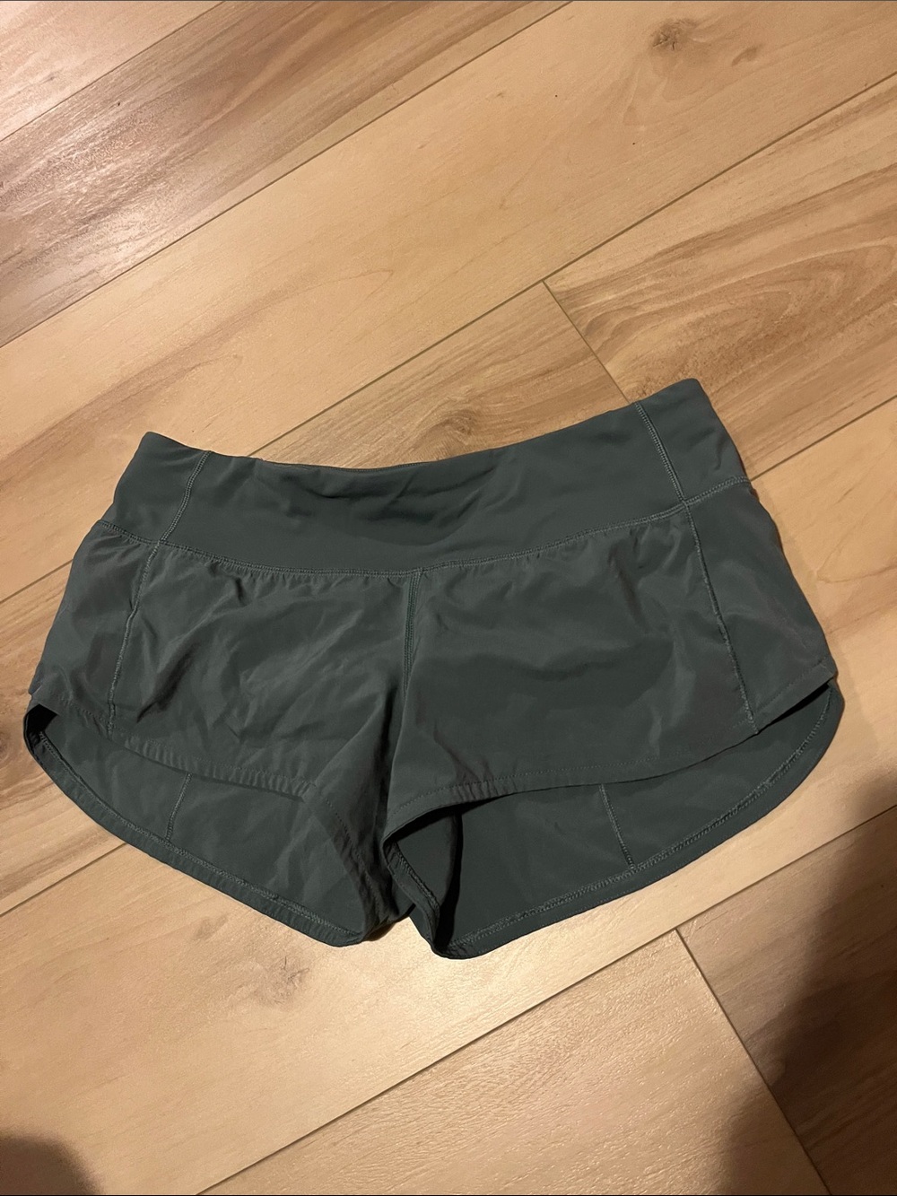 57. LULU LEMON SHORTS - GREEN